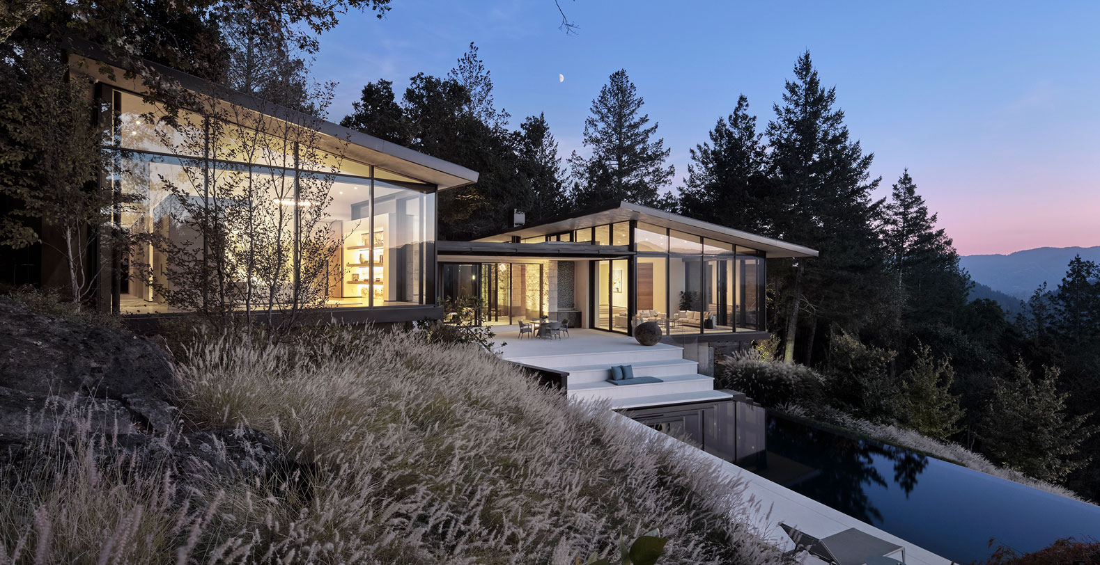 Forest Aerie exterior and pool dusk