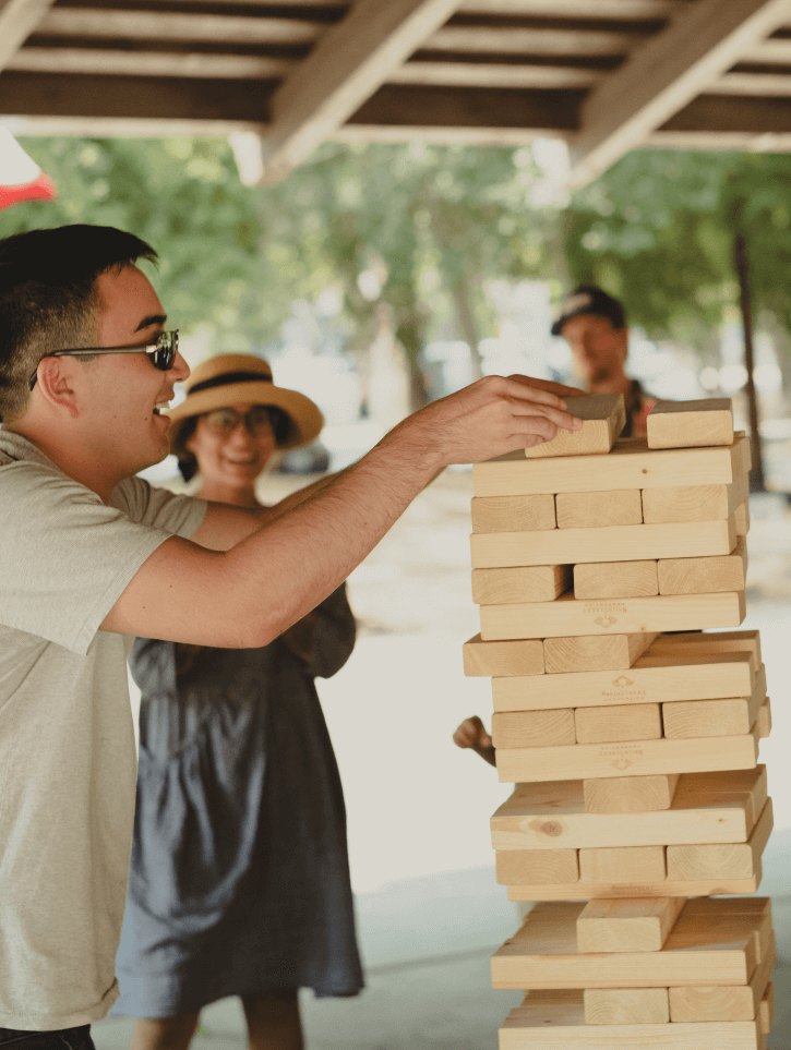 Benjamin Griesser playing giant Jenga