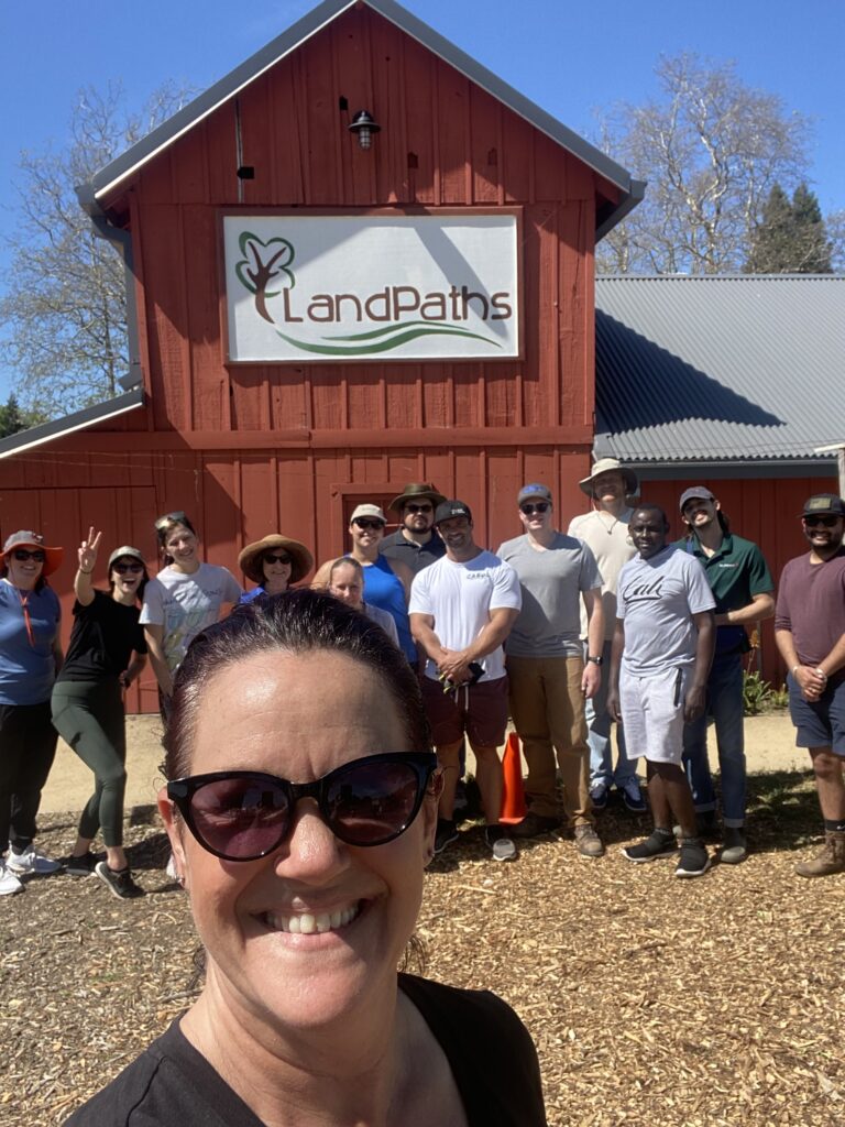 Selfie group photo in front of barn