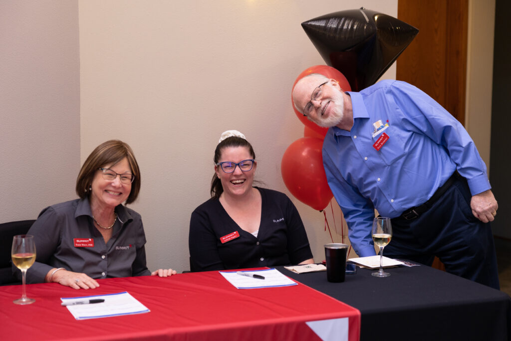 Three people at table